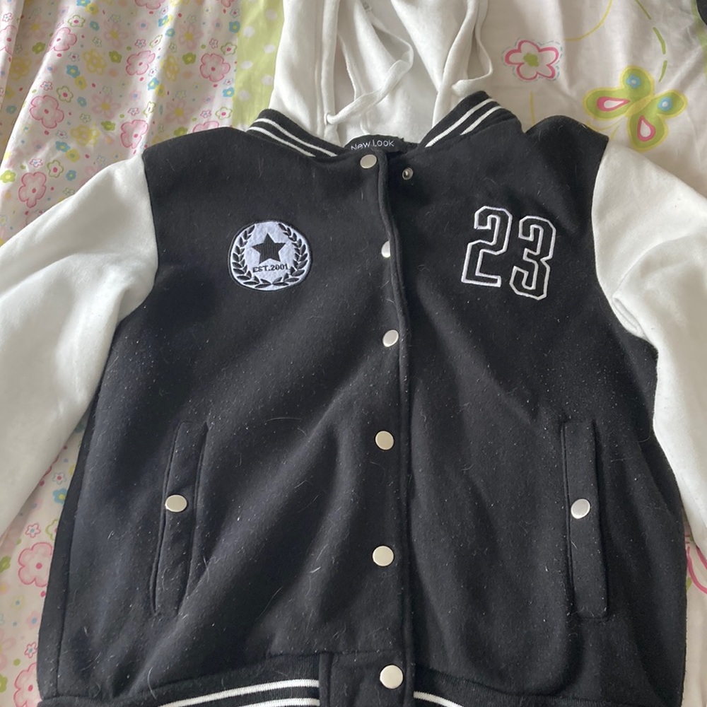 black and white “new look” varsity jacket